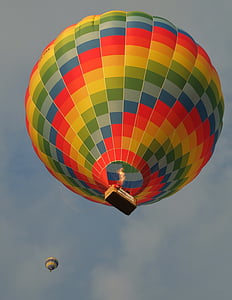 two multicolored hot air balloons