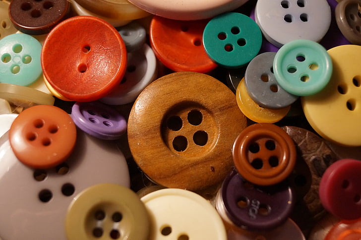 pile of assorted-color buttons