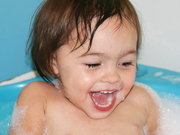 toddler bathing with bubbles