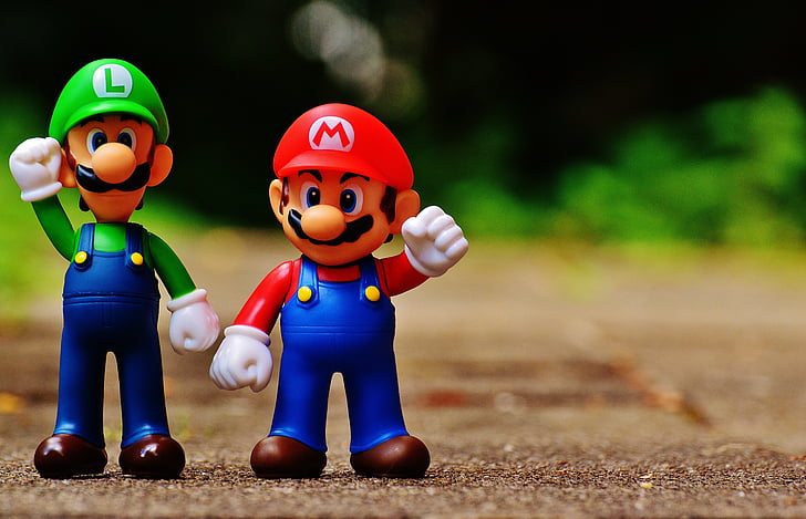 selective focus photography of Super Mario and Luigi figurines