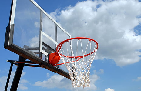 blue and white basketball system overlooking the white clouds