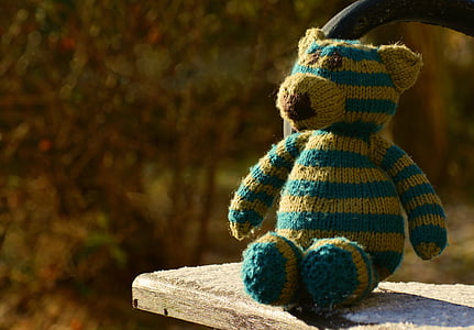 blue and brown stripe bear plush toy