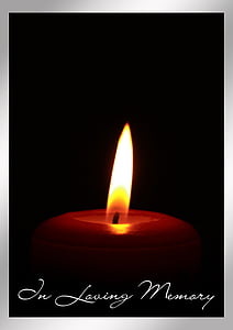 red pillar candle with text overlay