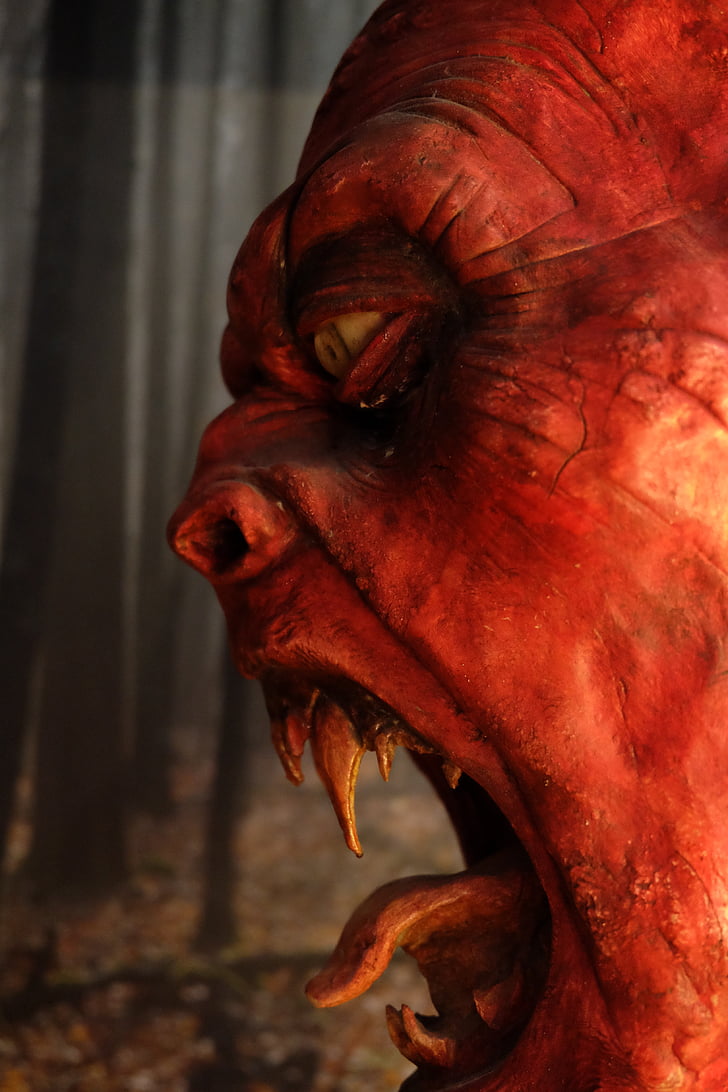 close-up photography of demon's face