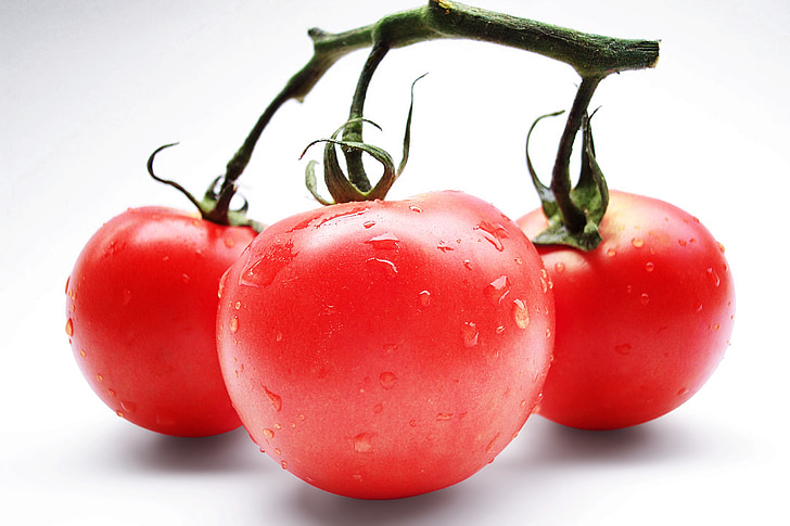 close-up photo of red tomato