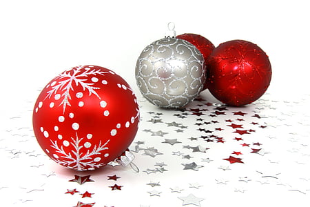 red and grey baubles against white background