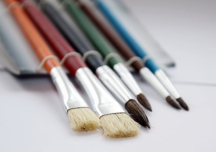 assorted-color paint brushes