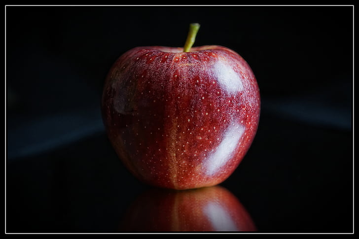 ripe apple with black background