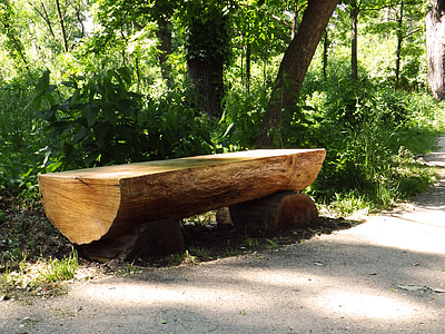brown wooden log bench