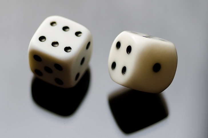 macro photography of two white dices