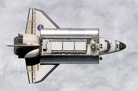white and black space shuttle photo