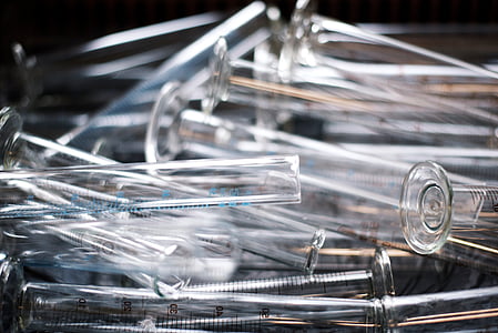 closeup photo of clear glass vial lot