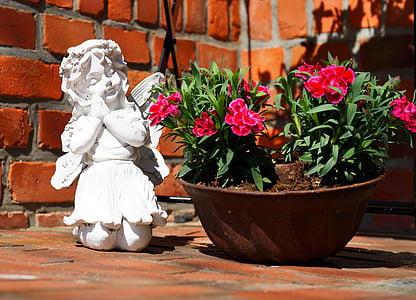 cherub and potted flowers