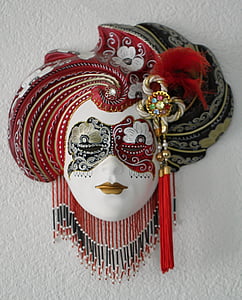 white, red, and blue masquerade mask