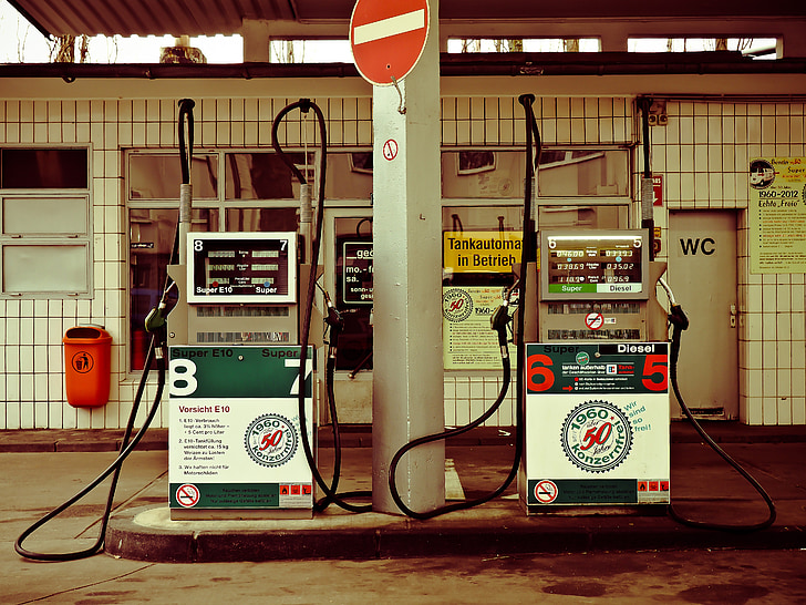 Royalty-Free photo: Three orange gas stations