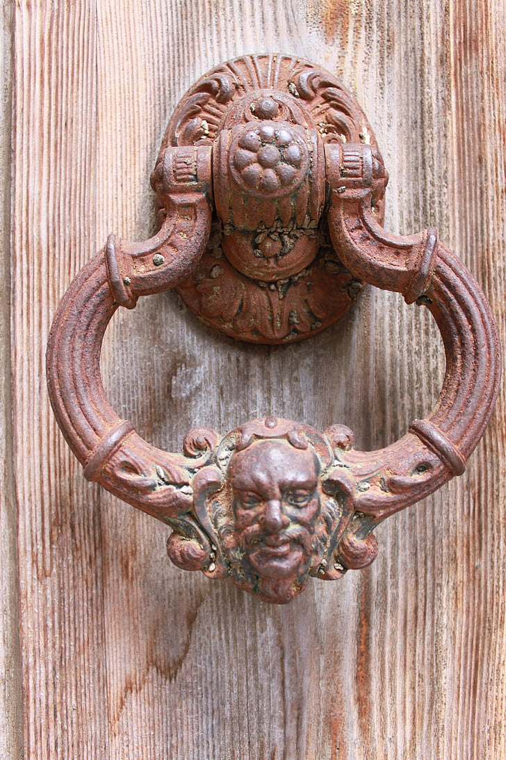 brown steel door knocker