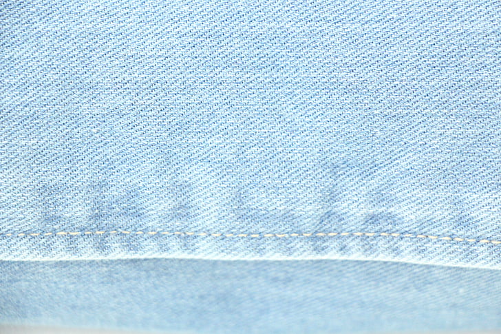 close-up photo of blue denim bottoms