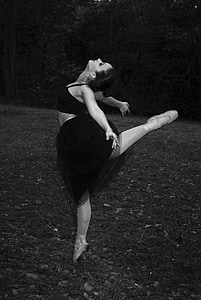 grayscale photography of woman dancing ballet