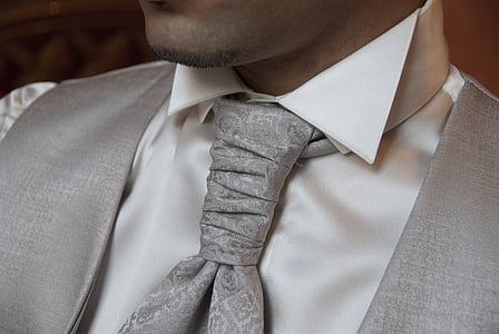 photo of man wearing gray necktie