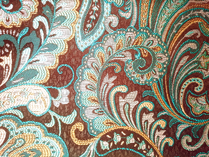 brown and green floral textile