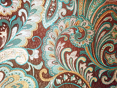 brown and green floral textile
