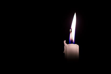 white lighted candle