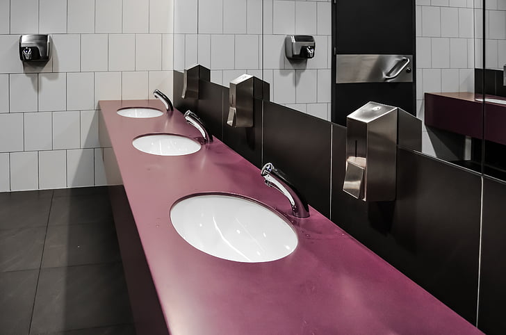 purple bathroom sink with mirror