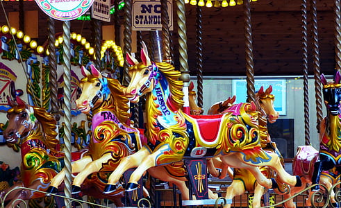 gold-and-red horse carousel