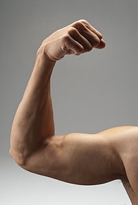 man flexing muscle