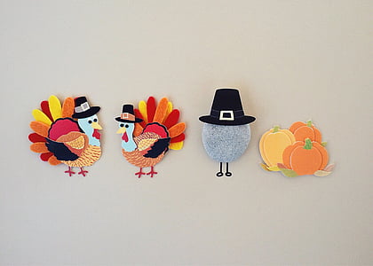 four assorted turkey wall decor