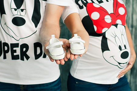 matching pair of Mickey and Minnie Mouse graphic crew-neck t-shirts