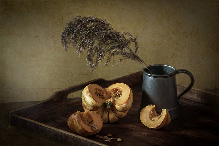 gray stainless steel cup beside squash vegetable still-life painting