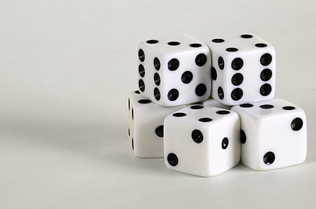 five white-and-black dice close-up photo