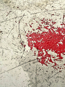 red paint splash on floor