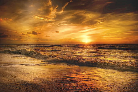 sunset over beach shore