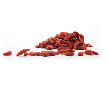 pile of red dried seeds