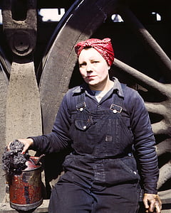 woman holding red metal bottle