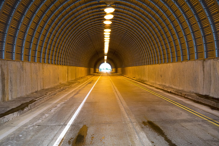 gray concrete tunnel road