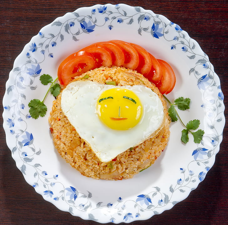 fried rice on white ceramic plate