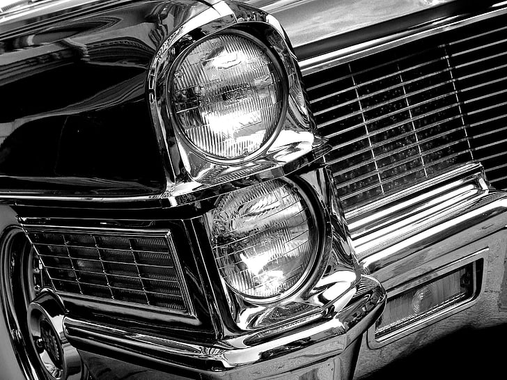 grayscale photo of classic vehicle