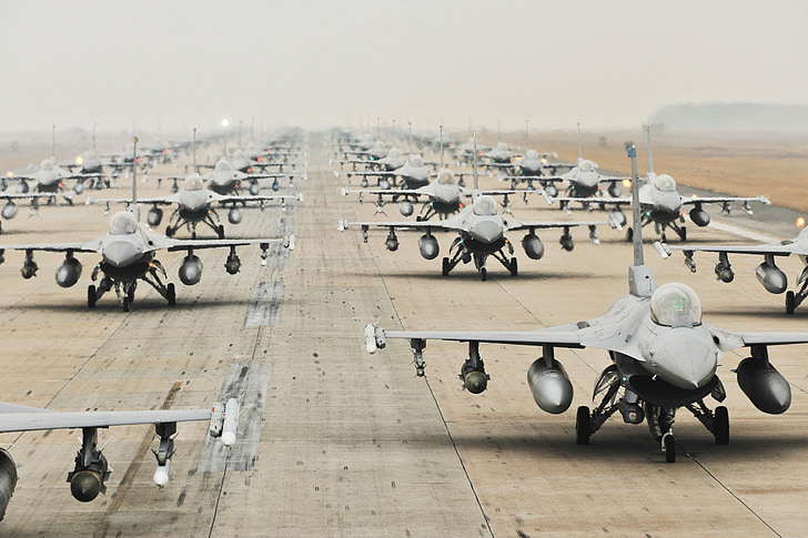 gray fighter jets on runway during daytime