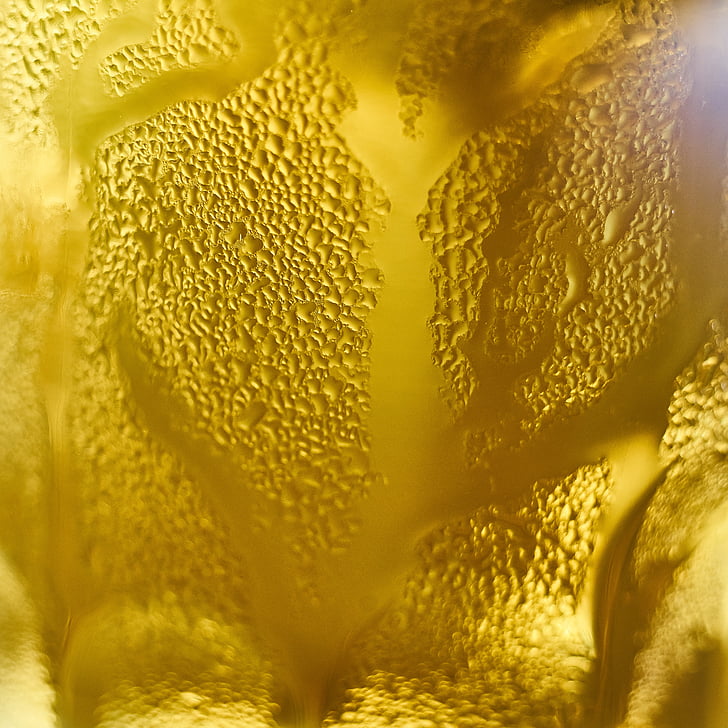 close-up photo of yellow liquid