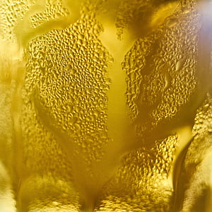 close-up photo of yellow liquid