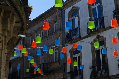 assorted-color hanging decors on street
