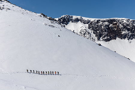 people on snow capped mountain