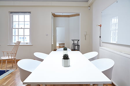 rectangular white wooden dining table