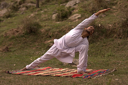 photograph of a man in yoga post