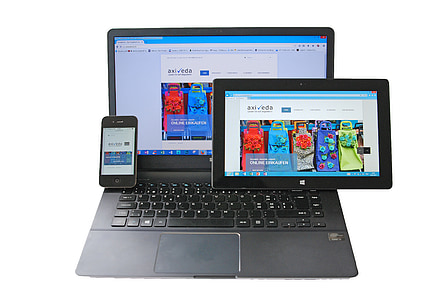 black laptop computer; black Microsoft Surface Pro 2 2-in-1 laptop; black iPhone 4