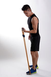 man in black tank top doing exercise