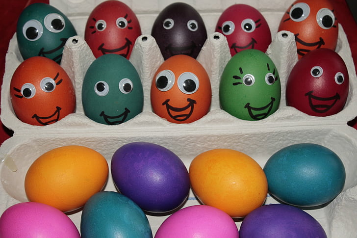 assorted-color Easter eggs with gray tray